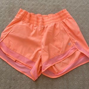 Athleta neon orange shorts